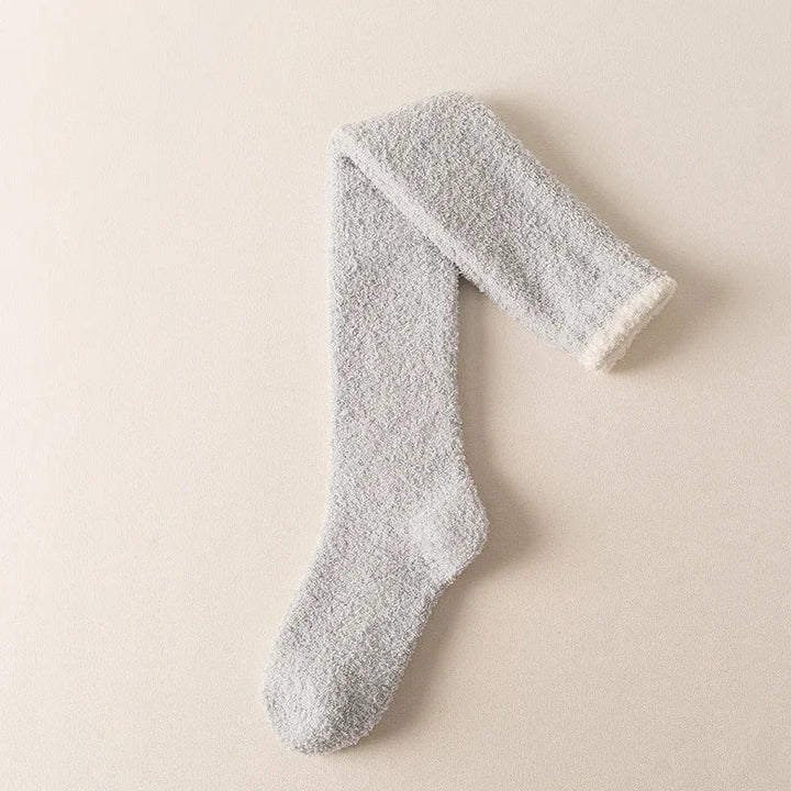 Knee high fuzzy socks for women, providing extended warmth and softness for fall & winter.