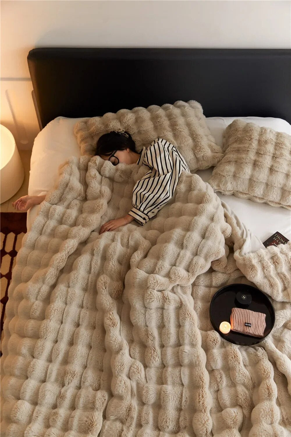 Ultra-soft plush fleece throw blanket in a cozy comfort design, perfect for home decor in living room or bedroom.