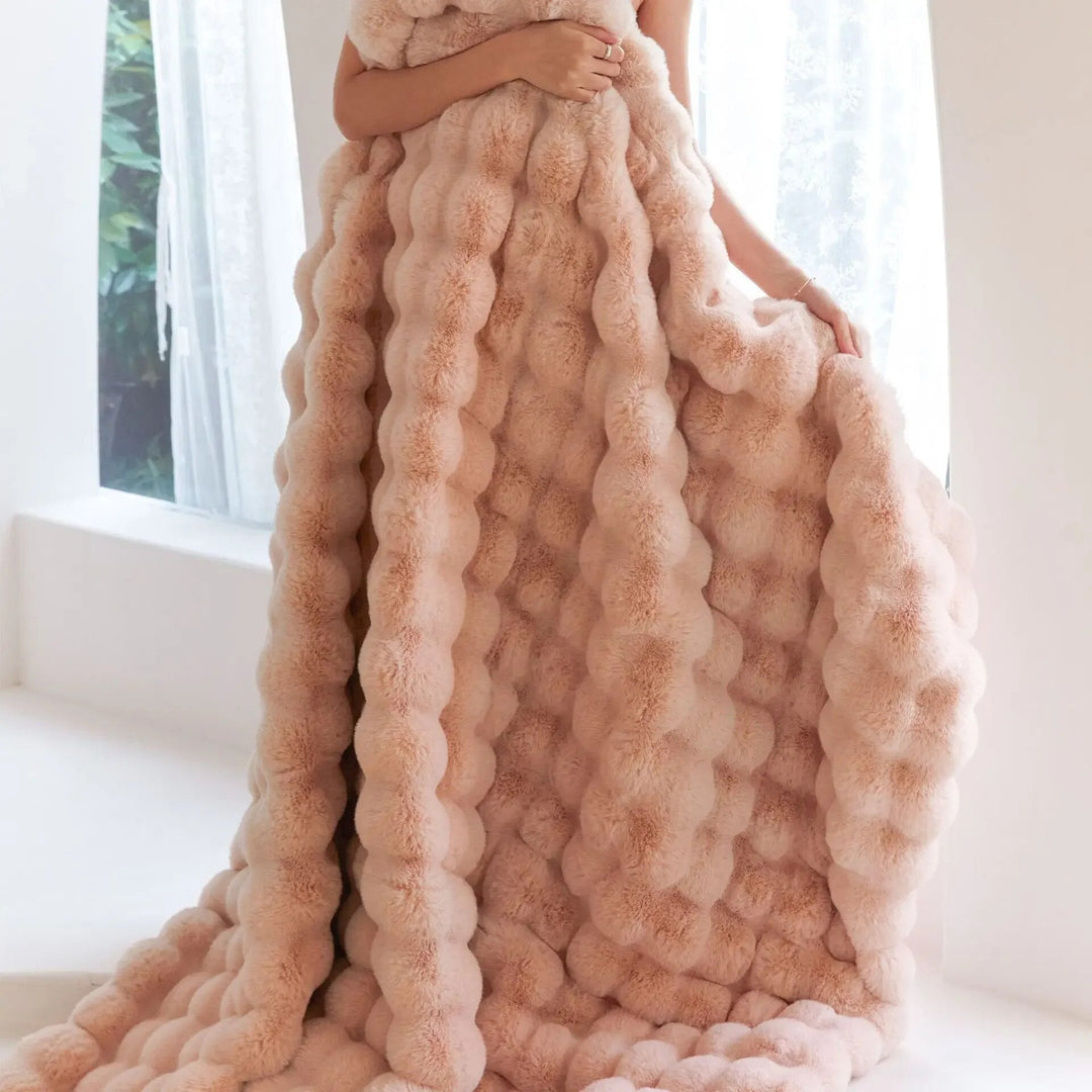 Warm and soft fleece throw blanket, an ultra-soft home decor essential for living rooms or bedrooms.