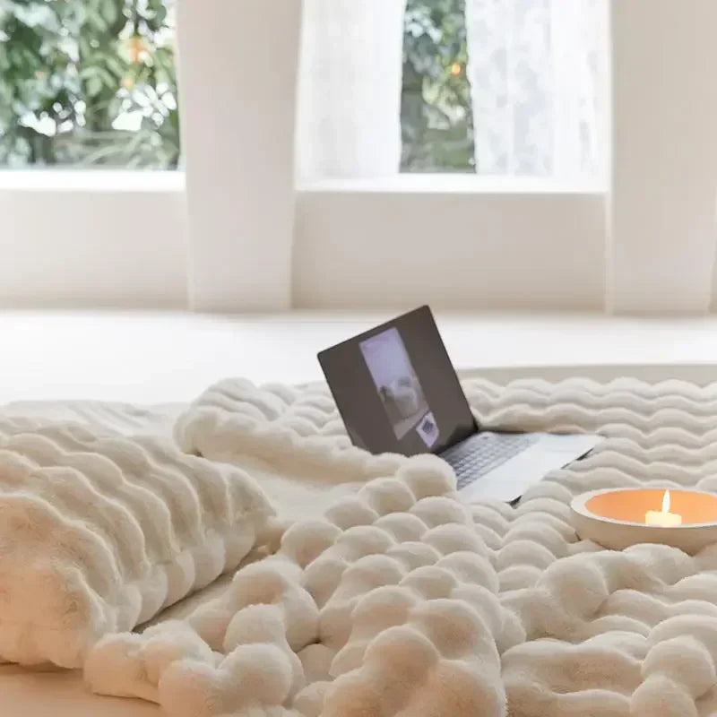 Snuggle up with this ultra-soft plush fleece throw blanket. A luxurious and warm addition to your home.