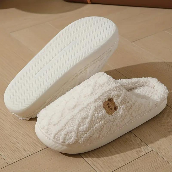 Comfortable women's plush slippers, soft house shoes perfect for lounge wear. Warm indoor footwear for ultimate home comfort.
