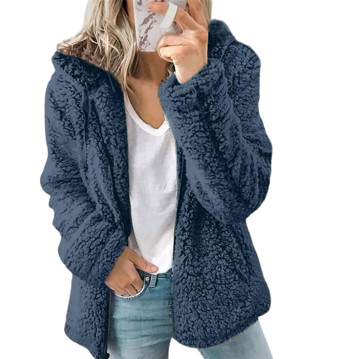 Women's warm and fuzzy teddy jacket with convenient pockets, perfect for everyday cozy winter style.