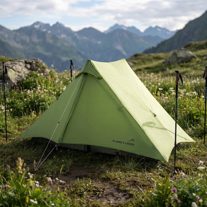 Ultralight 2-person backpacking tent pitched in a scenic mountain landscape, perfect for hiking and outdoor adventure.