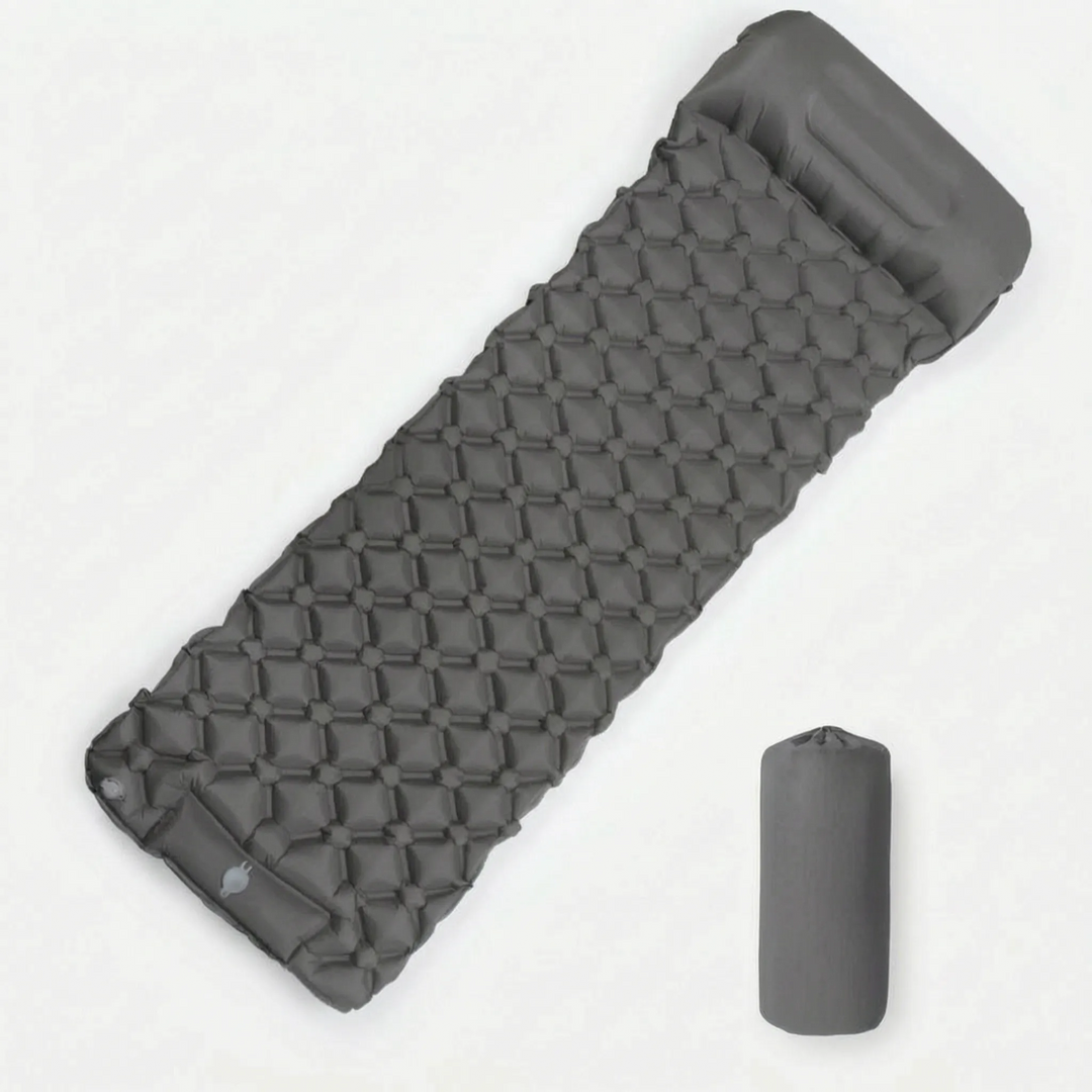 Ultralight camping sleeping pad with built-in foot pump, ideal inflatable gear for backpacking and hiking.