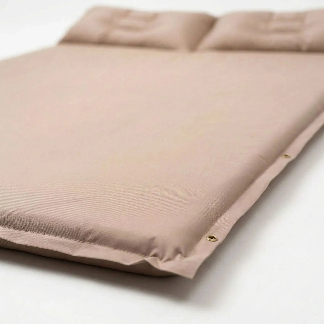 Rolled ultralight sleeping pad for camping. Compact and portable camp mattress, ideal for hiking adventures.