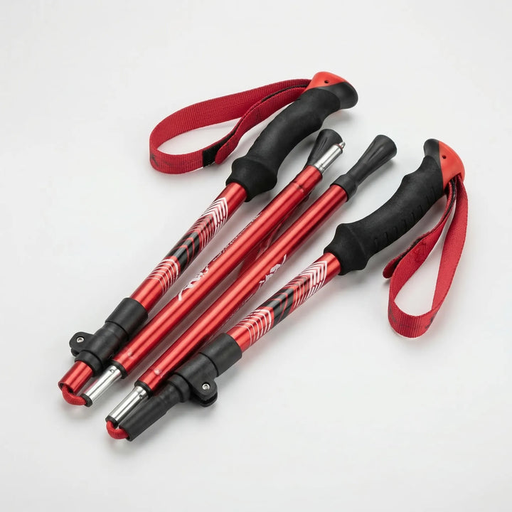 Unisex folding ultralight trekking poles, adjustable for all heights. Essential aluminum hiking gear for outdoor adventures.