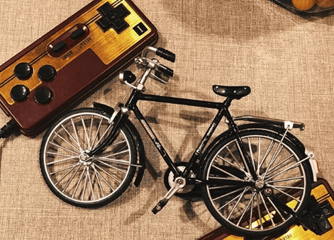 Close-up of DIY Retro Bicycle Model Kit, intricate parts for an engaging adult craft project.