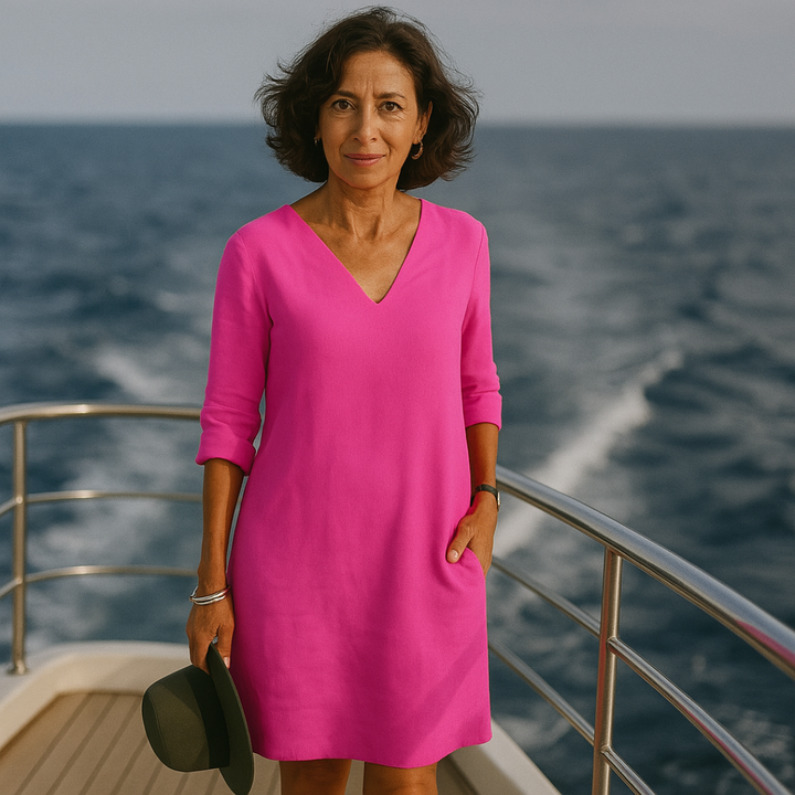 Women's unique flowy summer midi dress, an effortless holiday outfit offering versatile and comfortable style.
