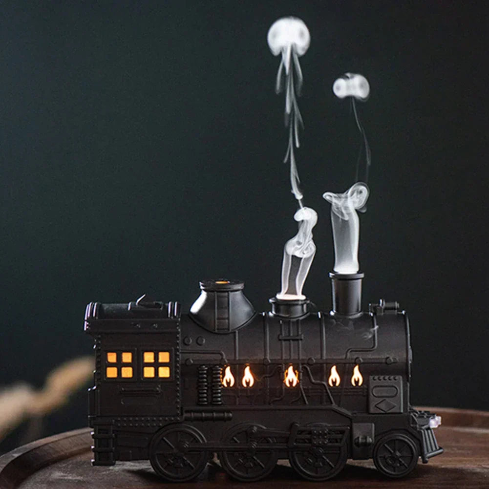 Relaxing aromatherapy diffuser with locomotive design. Spreads essential oils, creates calming mood light & steam.