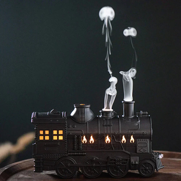 Relaxing aromatherapy diffuser with locomotive design. Spreads essential oils, creates calming mood light & steam.