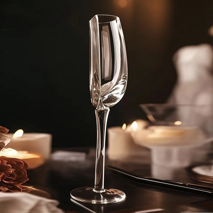 Modern clear stemmed wine glass with unique half-full design, perfect artistic glassware for kitchen & home decor.