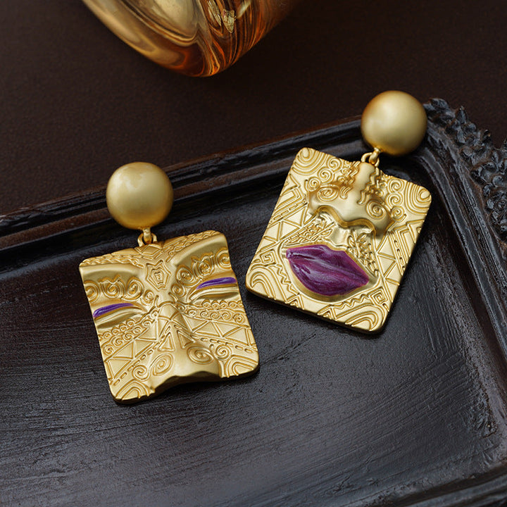 Gold plated women's retro asymmetrical earrings, unique statement jewelry with push back.