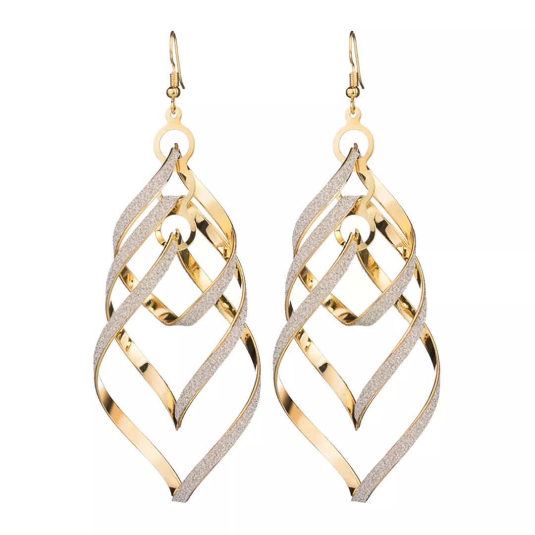 Elegant gold-plated spiral dangle earrings for women. Fashionable unique statement jewelry.