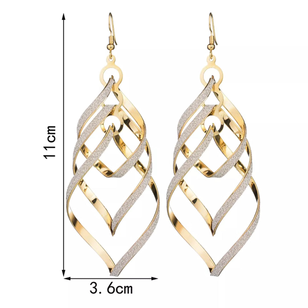 Gold-plated unique spiral earrings for women. Statement dangle design, perfect fashion accessory.