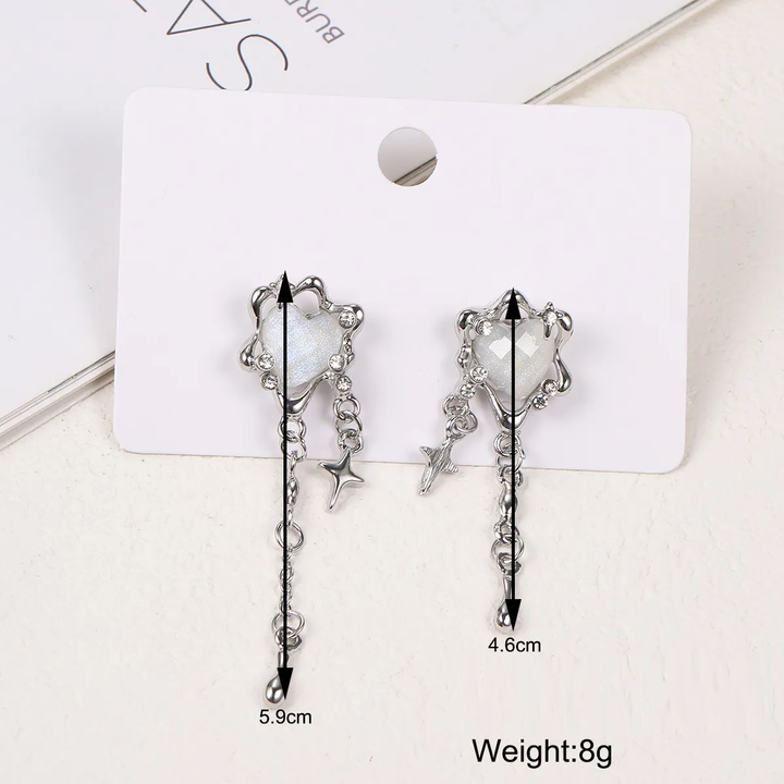 Elegant women's unique irregular heart, star, and tassel earrings. Fashionable sterling silver jewelry.