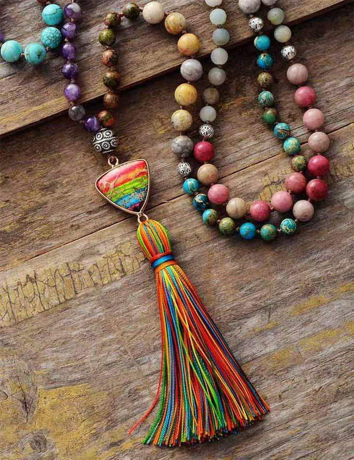 Exquisite 108-bead mala necklace crafted with diverse gemstones, promoting inner calm.