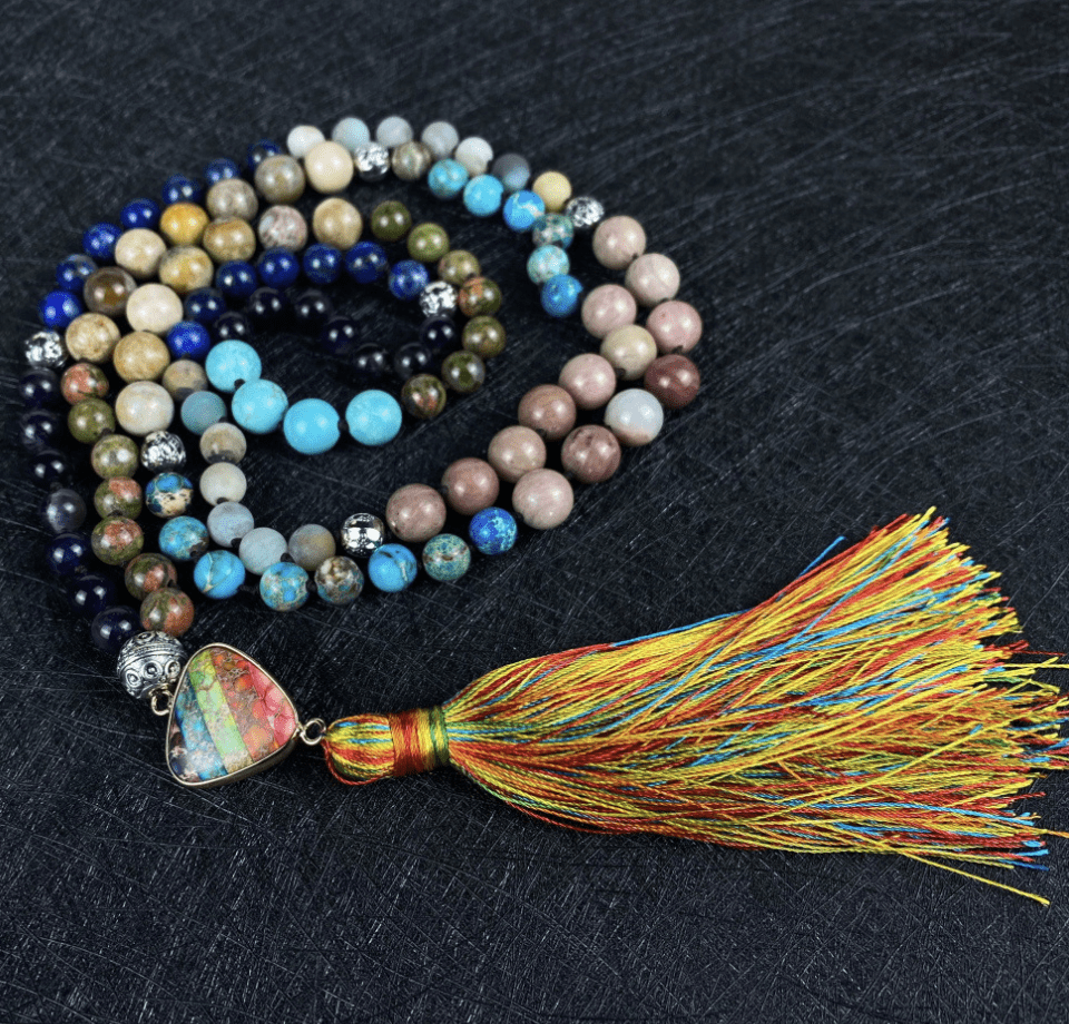 Unisex gemstone mala necklace, 108 beads for yoga, meditation, and inner harmony.
