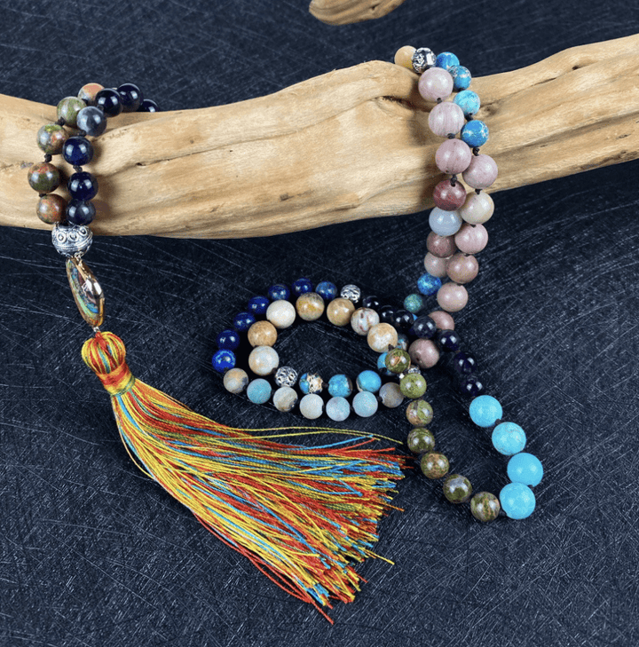 Altheira enlightenment mala necklace with polished gemstones, enhancing spiritual journey.