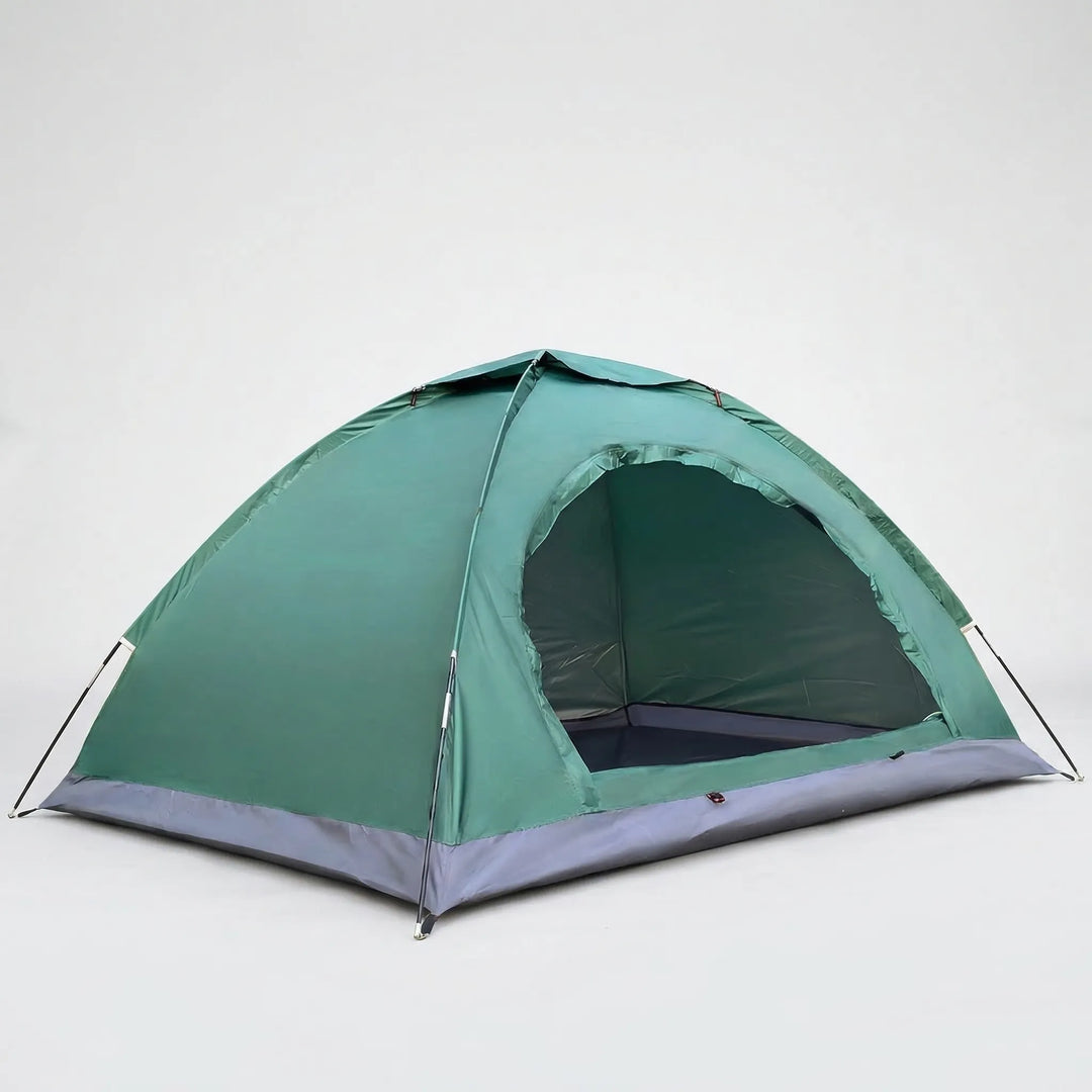 Adventure-ready 2-person quick setup tent pitched in a scenic mountain campsite, portable for hiking.