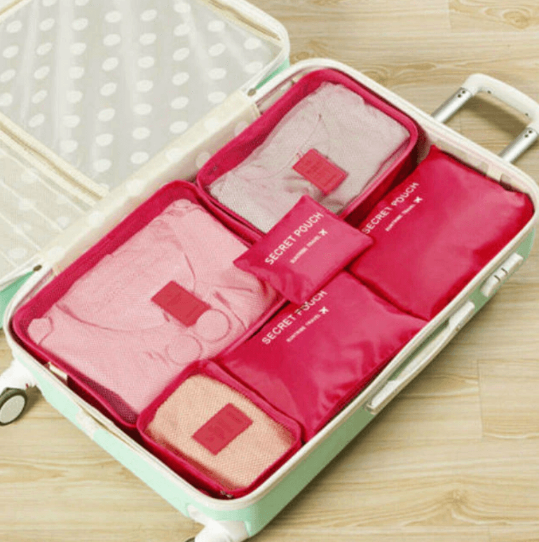 Product tag showing 'Space-Saving Travel Storage Bags' on a packing cube