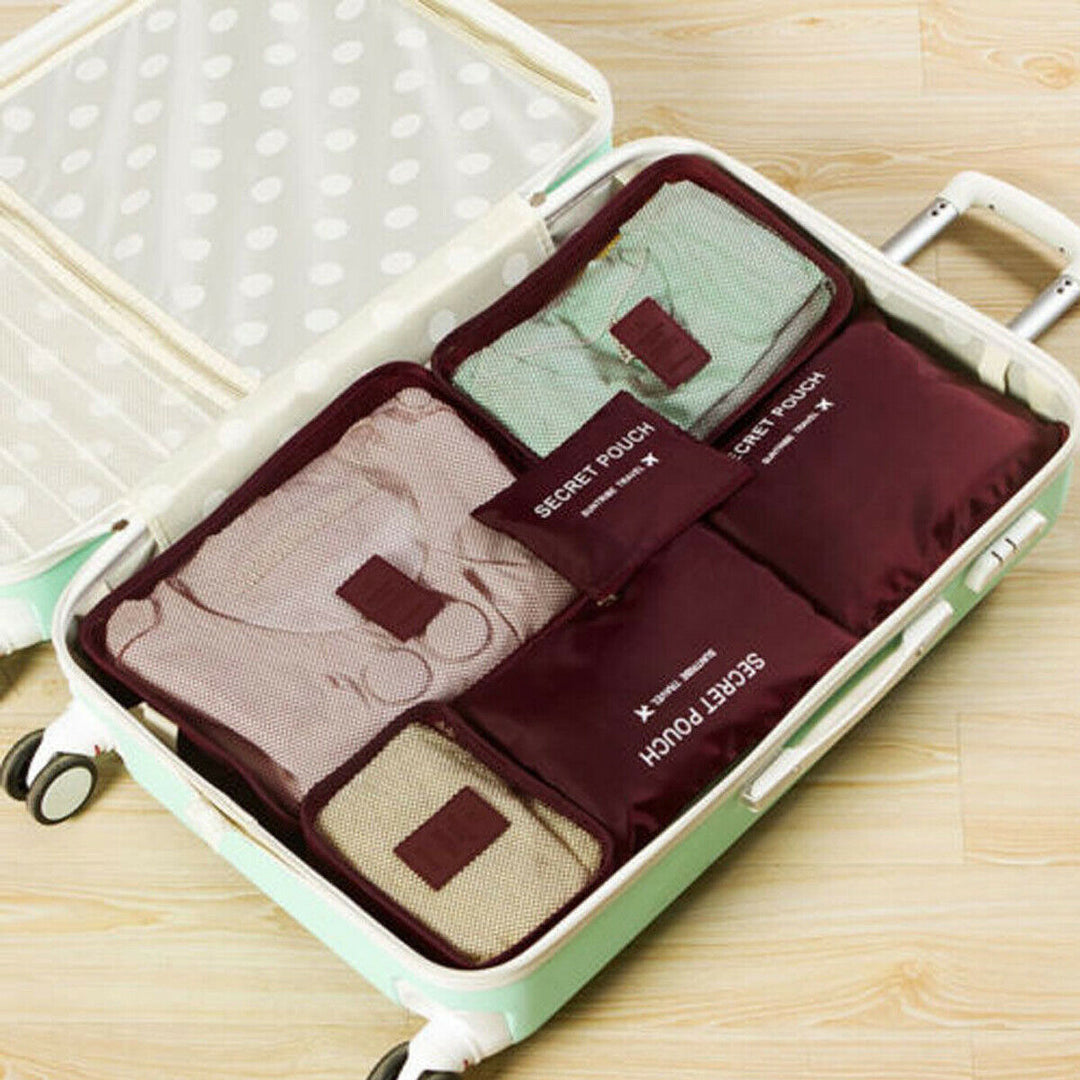 Unisex 2-set luggage packing cubes. Essential space-saving travel accessories for organized trips.
