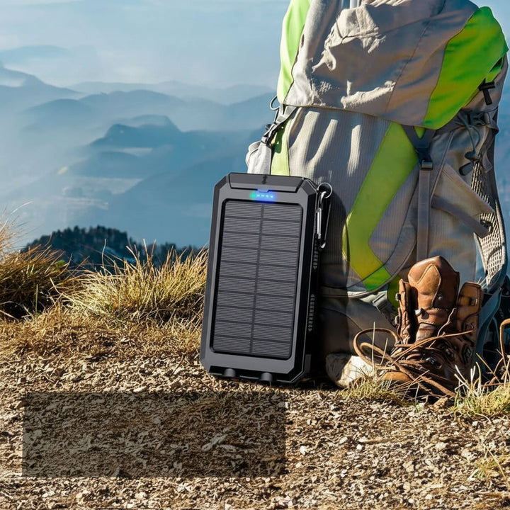 Durable 20000mAh waterproof solar power bank, ideal portable charger for outdoor adventures & camping trips.