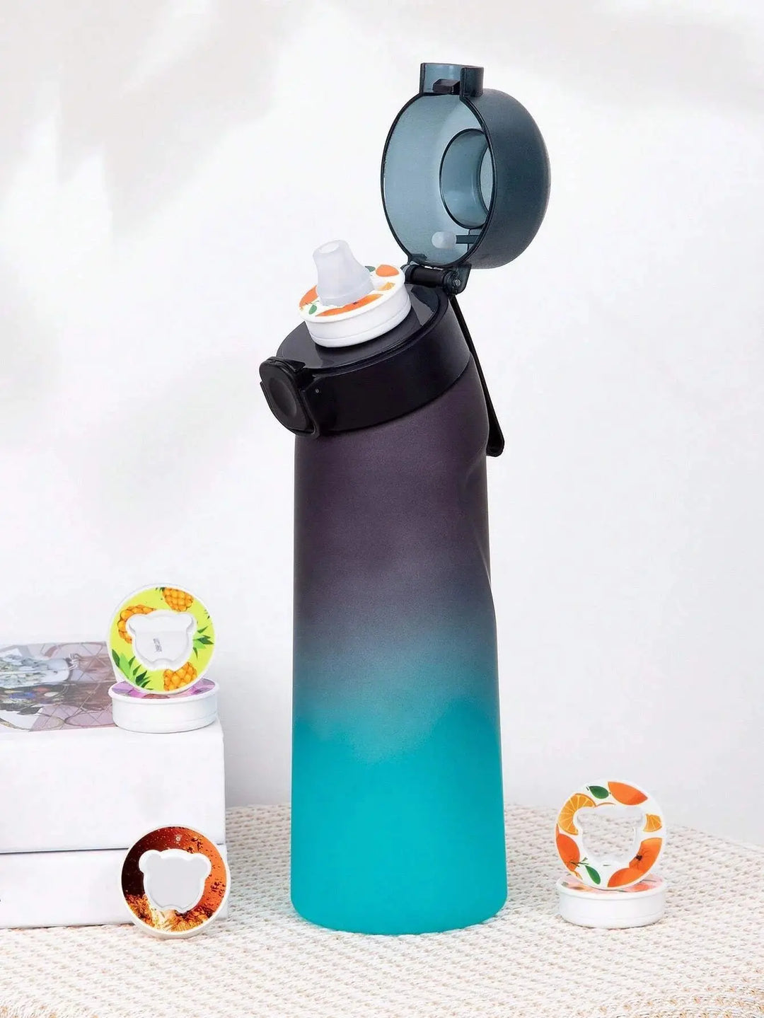 Reusable 0.65L aroma water bottle. Experience flavor pods for refreshing, healthy drinking.