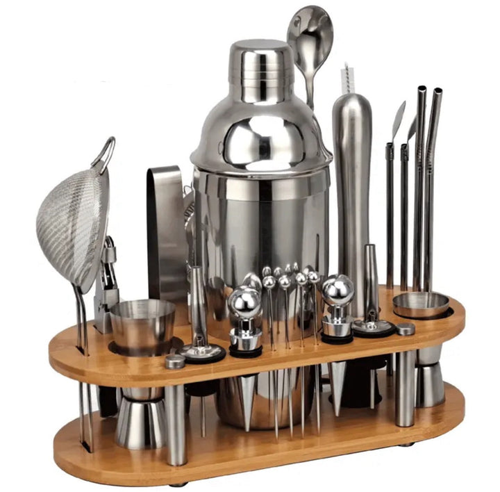 Close-up of 23 premium stainless steel bar tools including shaker, jigger, and muddler for mixology.