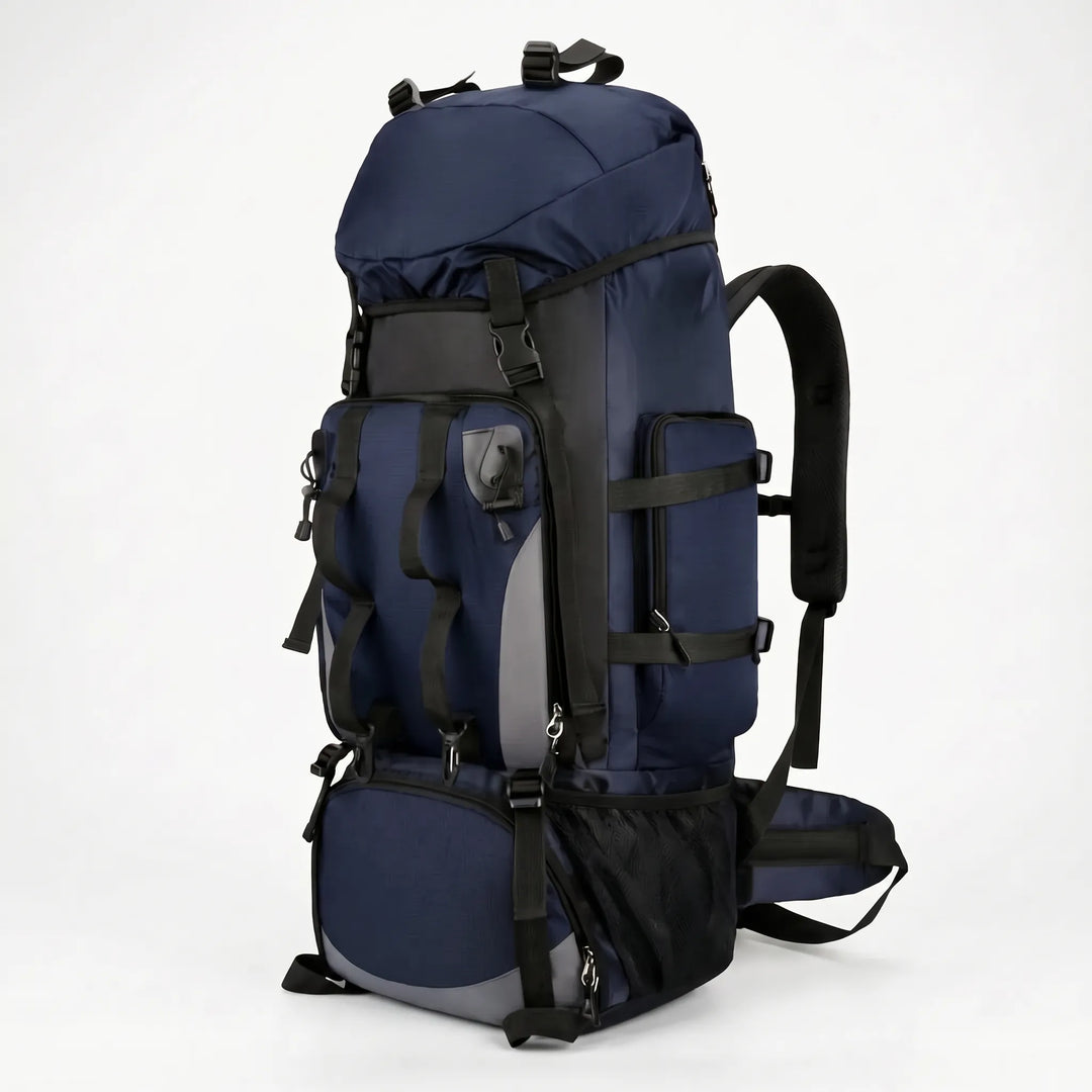 Unisex 24gal large hiking backpack resting on a trail, ready for an extended camping or outdoor adventure trip.
