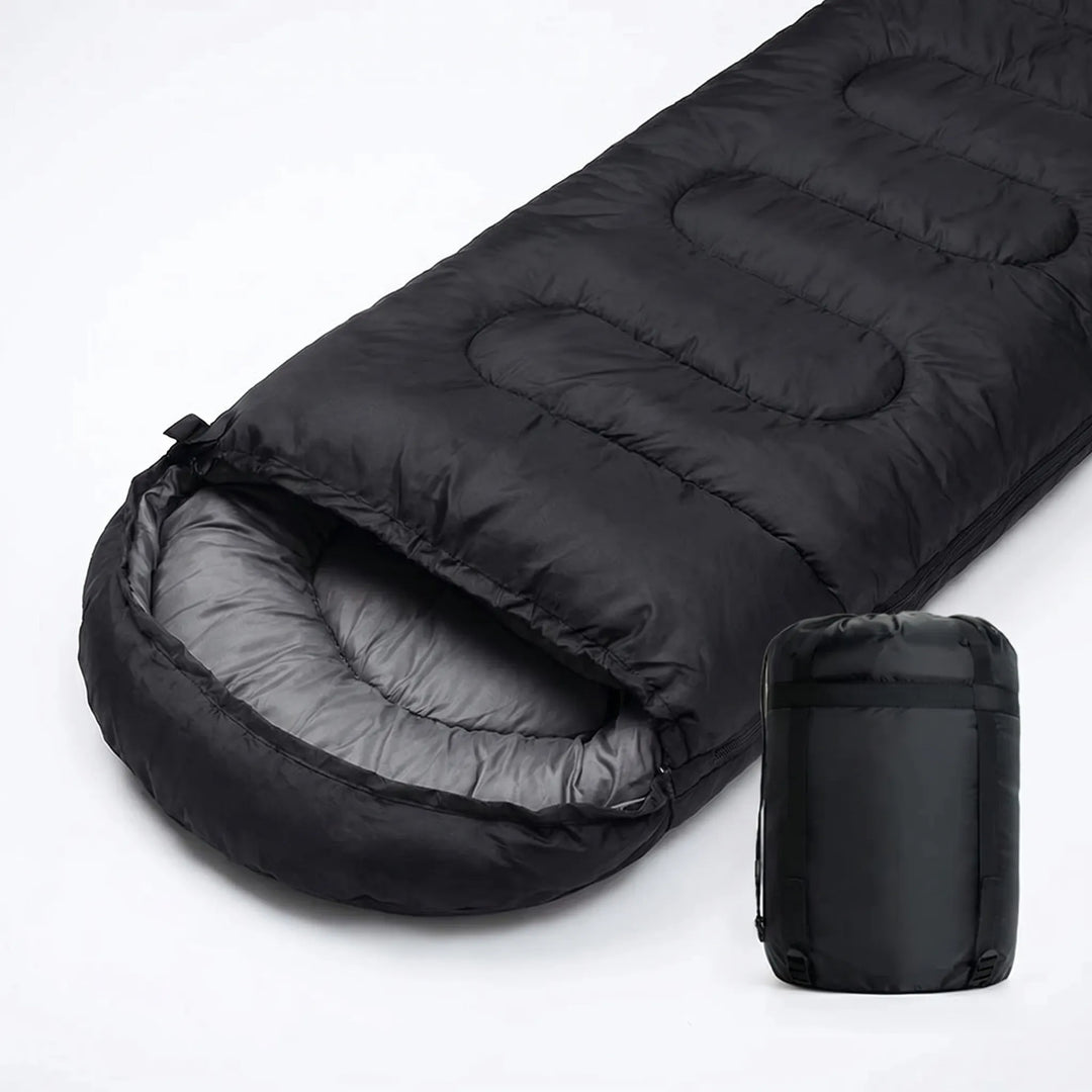 Spacious envelope sleeping bag, unisex 4-season design for comfortable camping & travel outdoors.