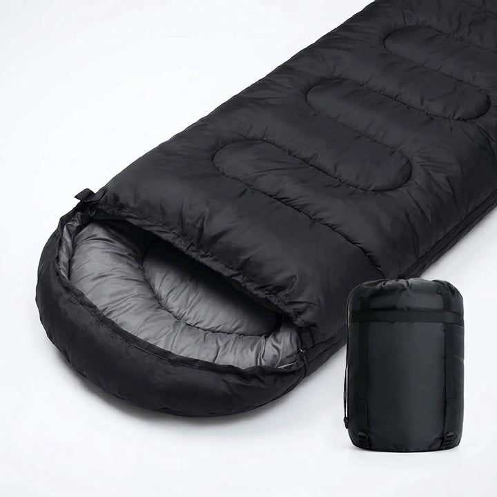 Spacious envelope sleeping bag, unisex 4-season design for comfortable camping & travel outdoors.