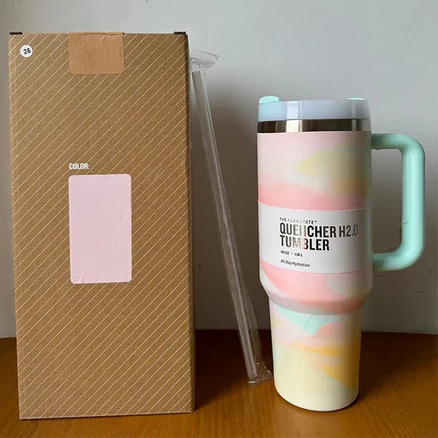 Ergonomic 40oz reusable coffee mug, vacuum insulated, with straw lid for travel.
