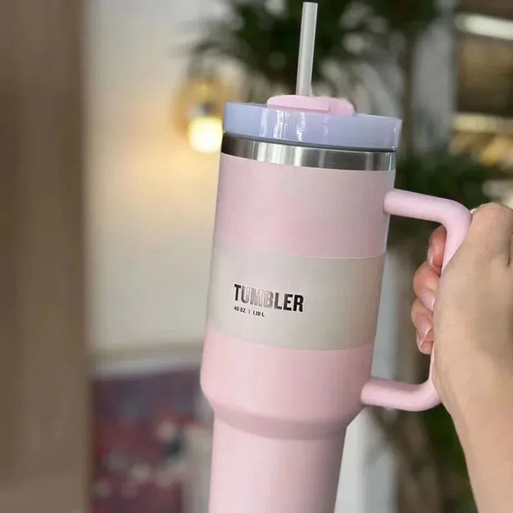 Colorful powder-coated 40oz insulated travel mug with straw and leak-proof lid.