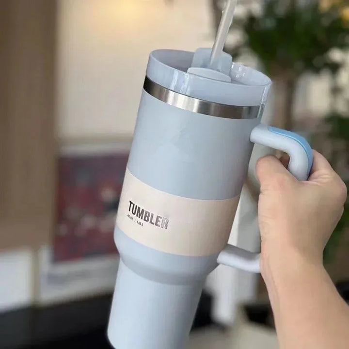 Unisex 40 fl oz vacuum cup with straw & lid, ideal for daily hydration and travel.