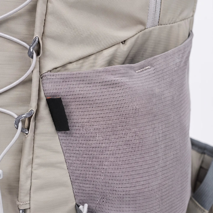 Versatile 6.6-gallon unisex hiking backpack, ideal for camping, outdoor trails, and daily travel, includes rain cover.