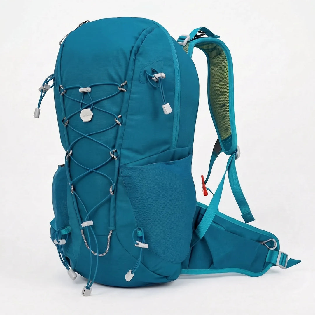 Essential 6.6-gallon lightweight daypack for hiking, camping, & outdoor travel, includes integrated rain cover.