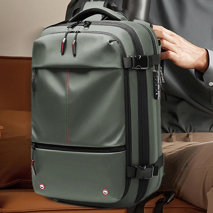 Waterproof travel backpack, 60L, with a dedicated laptop compartment, in a sleek black finish.