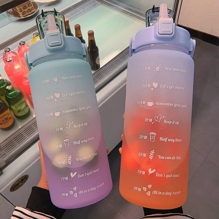 Unisex 64 fl oz motivational water bottle with time markers, perfect for daily hydration & fitness goals.