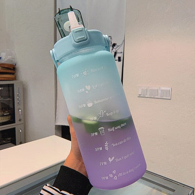 Durable half-gallon sports water bottle, BPA-free, leak-proof, featuring motivational time markers.