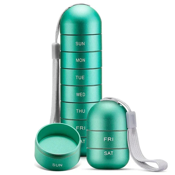Portable 7-day aluminum travel pill box for daily medication & supplements.