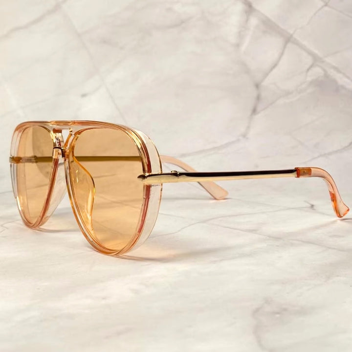 Timeless 70s aviator sunglasses, unisex design, modern gradient lenses & 100% UV protection.
