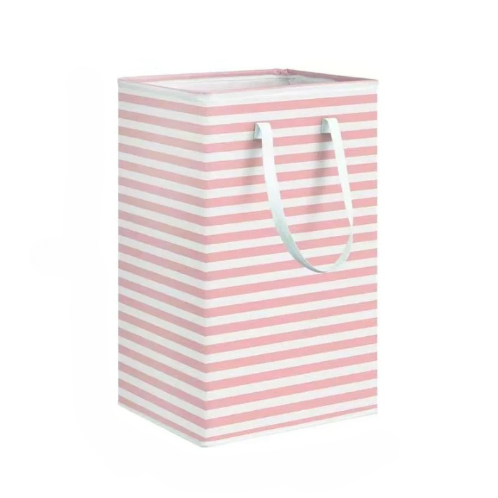 Arrangement of a 75L striped Solen laundry hamper with handles, demonstrating its decorative yet functional use