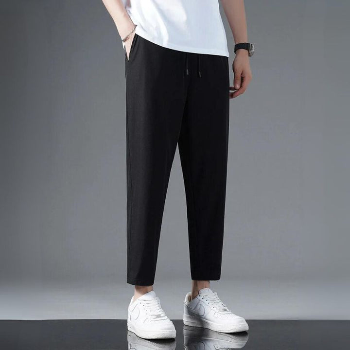 Comfortable unisex casual pants for daily wear. Stretchy, breathable activewear offering ultimate mobility and relaxation.