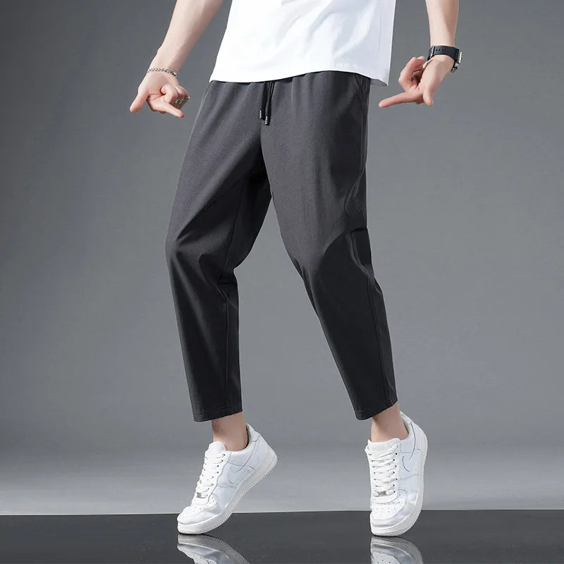Stylish unisex athletic pants. Comfortable, stretchy activewear for versatile performance, workout gear & casual style.