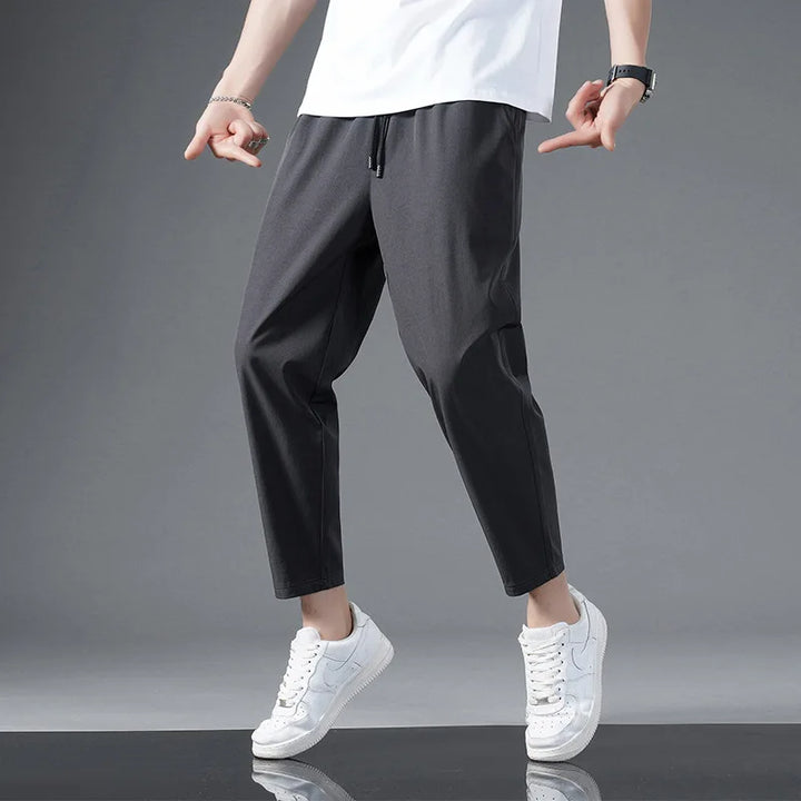 Stylish unisex athletic pants. Comfortable, stretchy activewear for versatile performance, workout gear & casual style.
