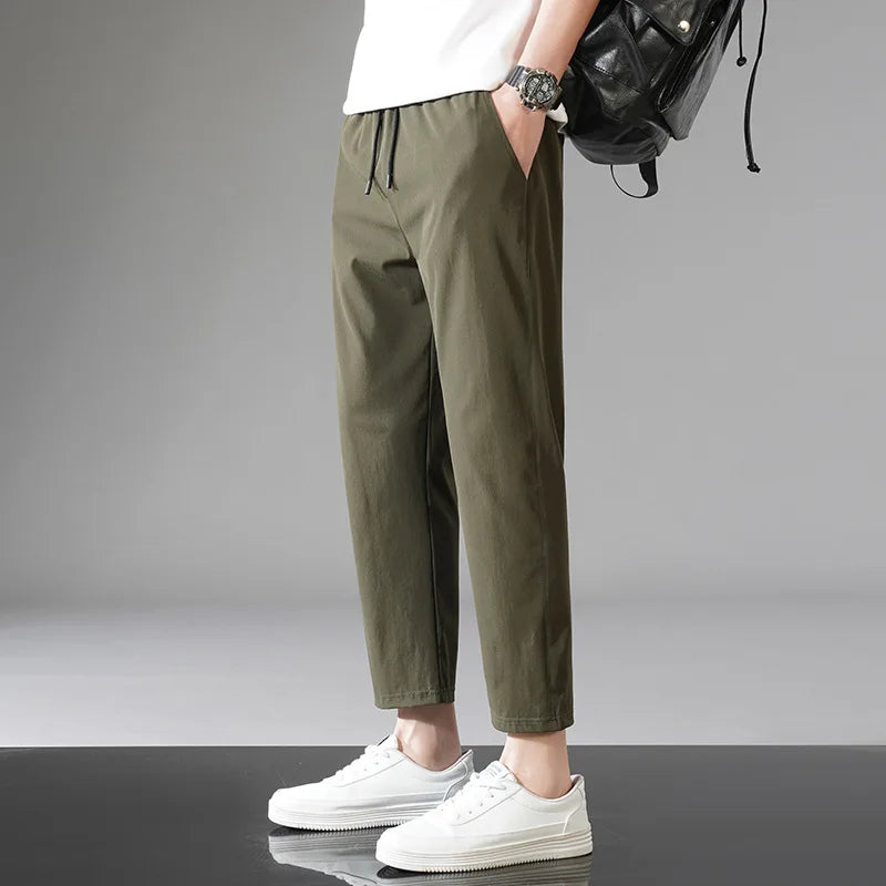Versatile unisex performance pants. Stretchy, comfortable activewear suitable for workouts, daily wear, & athletic activities.