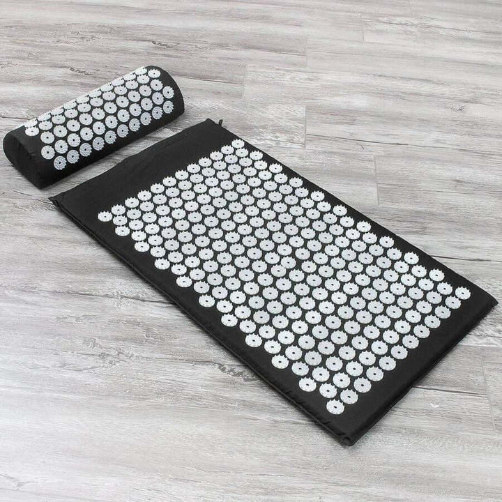Acupressure pillow for neck & head pain relief, promoting deep relaxation, stress reduction, & self-care.