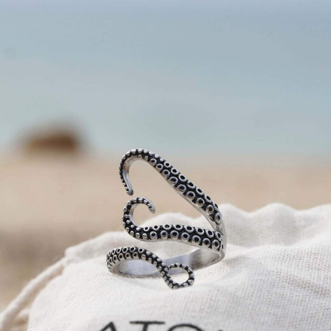 Unisex adjustable silver tentacle ring with ocean-inspired Nautilus design. Antique finish statement jewelry.