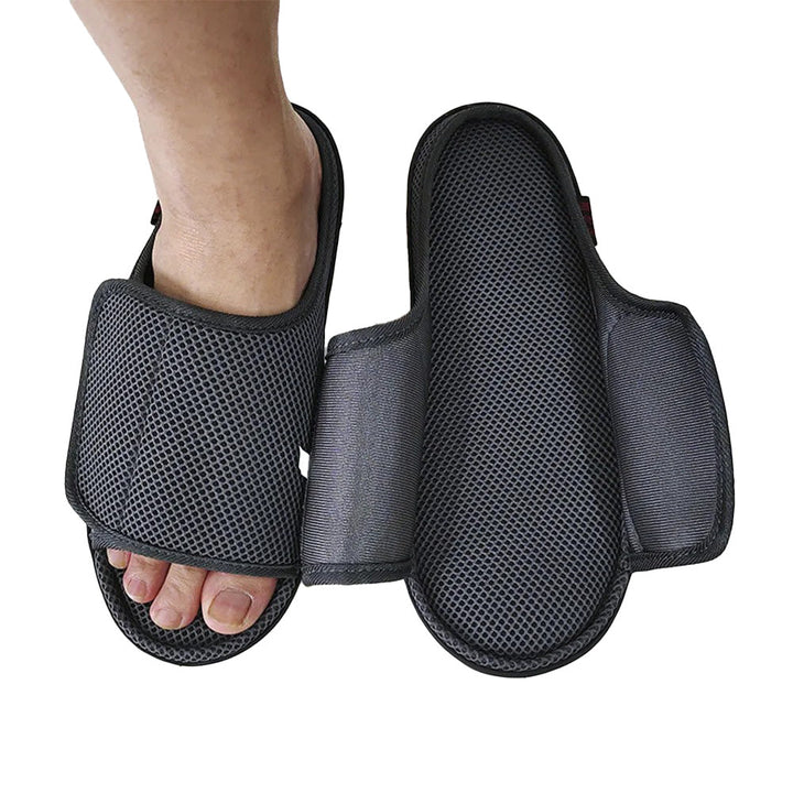 Unisex adjustable slippers for swollen feet. Comfort footwear for diabetic patients, featuring wide fit and easy hook & loop closure.
