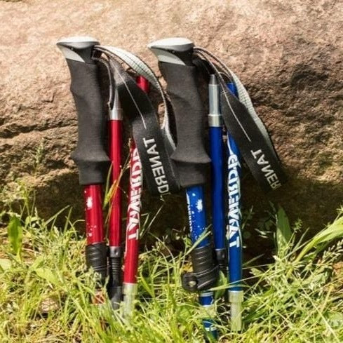 Versatile unisex adjustable trekking poles, foldable for easy travel. Lightweight hiking gear for any outdoor adventure.